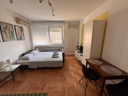 Una cama o camas en una habitación de Arena Belgrade