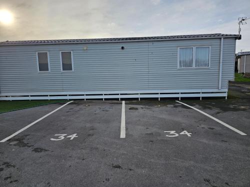 a parking lot in front of a building at 34 Brean Leisure Park Unity Beach 6 berth Passes optional No pets in Brean