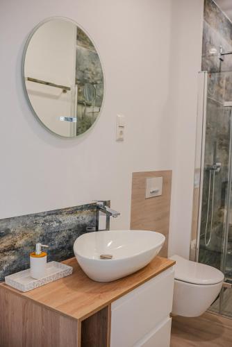 Ένα μπάνιο στο Ferienwohnung Am Waldteich