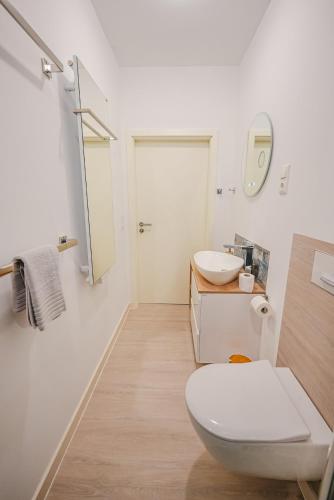 Ένα μπάνιο στο Ferienwohnung Am Waldteich