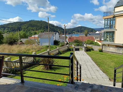 a view from the balcony of a house at Casa do Olmo in Porto de Espasante