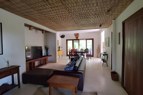 TV a/nebo společenská místnost v ubytování Licuri Praia de Algodões