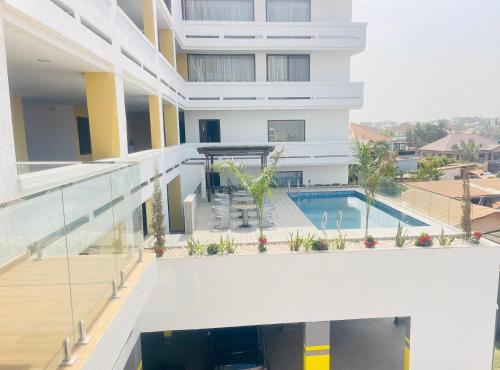 an aerial view of a building with a swimming pool at HS Apartment and Duplex in Ogbojo