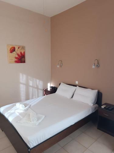Кровать или кровати в номере GIOTAS Apartments