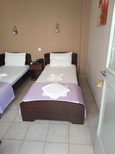 Кровать или кровати в номере GIOTAS Apartments