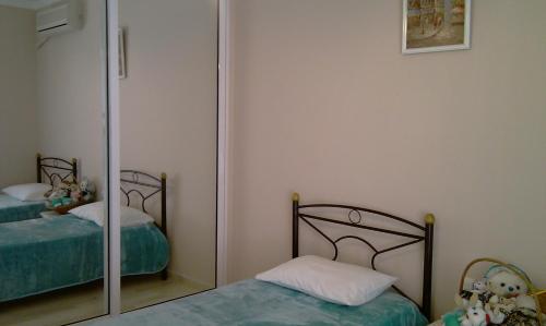 Ein Bett oder Betten in einem Zimmer der Unterkunft Family Apartment
