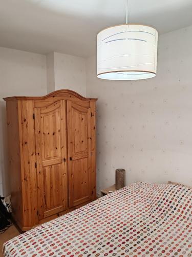 Ένα ή περισσότερα κρεβάτια σε δωμάτιο στο Appartement 1 chambre privée
