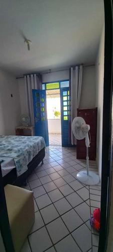 Katil atau katil-katil dalam bilik di Porto Canoa Apartamento