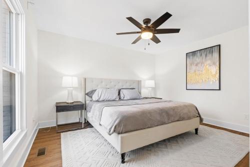 a bedroom with a bed and a ceiling fan at Modern 4 Bed in Quail Hollow in Charlotte