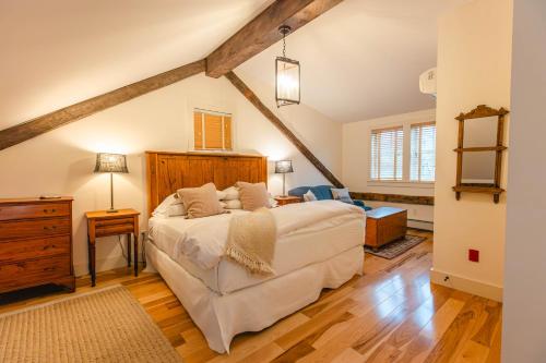 a bedroom with a large white bed in a room at Hill Farm Inn - Manchester in Sunderland