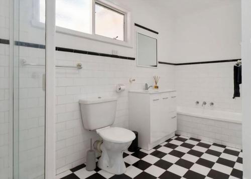 Et badeværelse på Beach House by the Bay