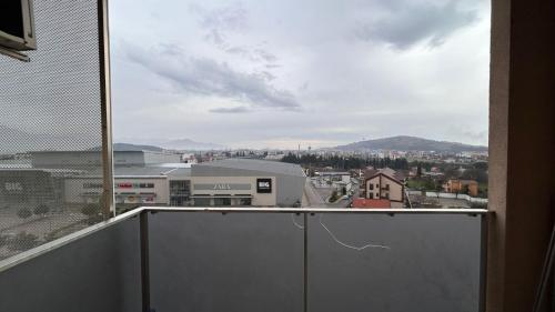 a view of a city from a balcony at City kvart 2 bedroom apartment in Podgorica