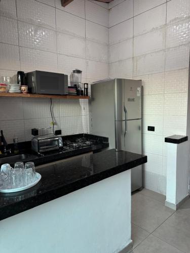 Dapur atau dapur kecil di Espaço praia boraceia