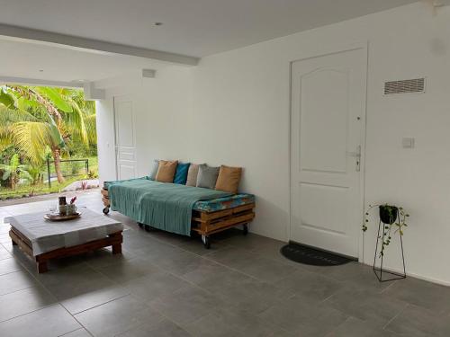 Postel nebo postele na pokoji v ubytování Chambre double bas de Villa