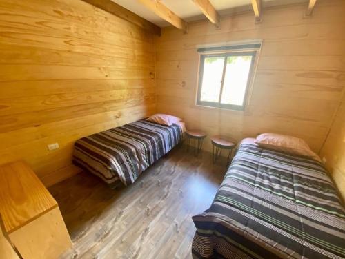 Cama o camas de una habitación en Cabaña AC Llifén