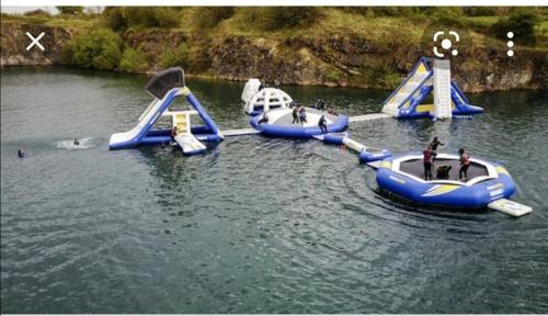 a group of inflatable slides in the water at Ballyhoura Country Kildorrery, beautiful 5 bed in Kildorrery