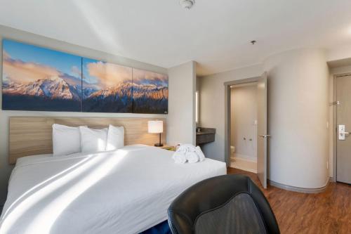 Letto o letti in una camera di Days Inn by Wyndham Thornton