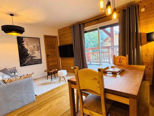 Appartement moderne 4 pièces, proche des remontées, parking inclus