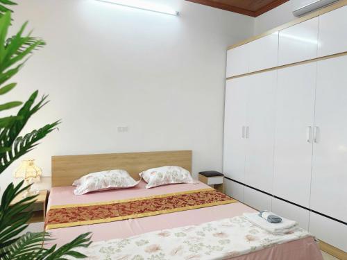 Postel nebo postele na pokoji v ubytování Chill House 702TM3