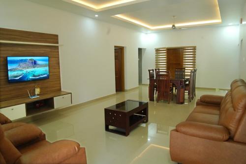 Fotografie z fotogalerie ubytování Modayil nest home v destinaci Kottayam