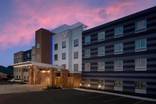 a rendering of the front of a hotel at dusk at Fairfield Inn & Suites by Marriott New Orleans Metairie in Metairie