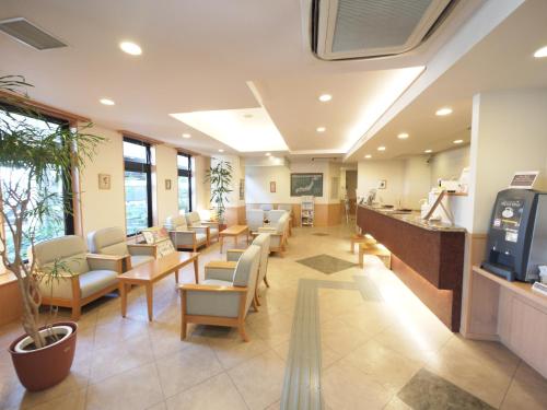 TV a/nebo společenská místnost v ubytování Hotel Route-Inn Niigata Kencho-minami