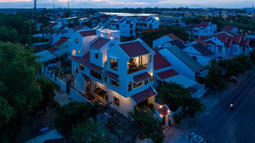 an aerial view of a house in a city at night at Hoianoi Villa_A Little Hoi An_Entire villa in Hoi An