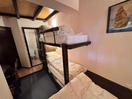 a couple of bunk beds in a room at Paragon of Arachova in Arachova