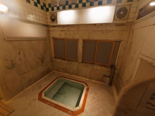 an overhead view of a shower in a bathroom at Ichinoyu Honkan in Hakone