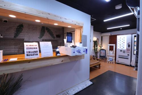 Kuchyň nebo kuchyňský kout v ubytování Spa & HOTEL La fontaine