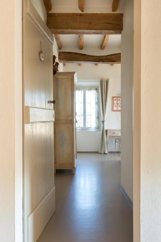 Ein Bett oder Betten in einem Zimmer der Unterkunft Verdenoce Agriturismo