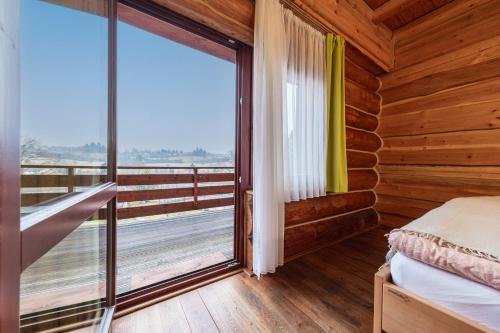 Postel nebo postele na pokoji v ubytování Sport-hotel Šibeniční vrch