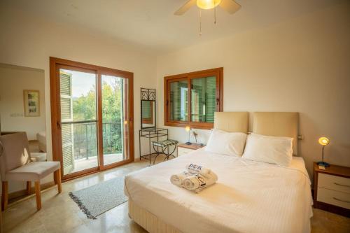 Ένα ή περισσότερα κρεβάτια σε δωμάτιο στο Beautiful Villa with stunning sea view