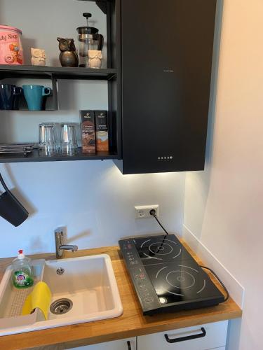 Skyview Suite I modern I kontaktloser Check-in I Business I Kurztrips I nachhaltigにあるキッチンまたは簡易キッチン