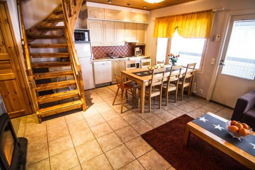 Kuchyň nebo kuchyňský kout v ubytování Vuokatti Apartments