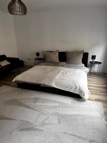 Katil atau katil-katil dalam bilik di Main Moment Altstadt Apartment