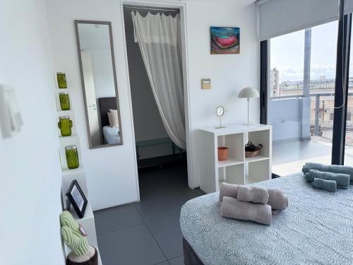 Ένα ή περισσότερα κρεβάτια σε δωμάτιο στο Kerameikos Spacious Loft