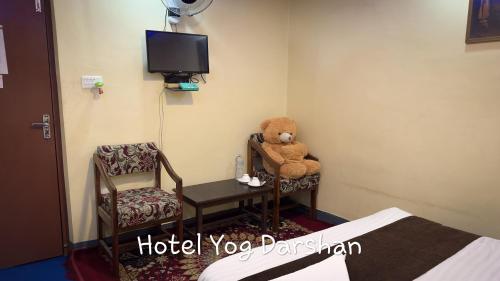 Hotel Yog Darshan電視和／或娛樂中心