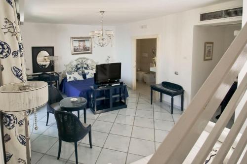 Μια τηλεόραση ή/και κέντρο ψυχαγωγίας στο Hotel Villa Sirio
