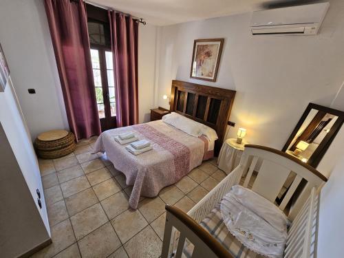 Postel nebo postele na pokoji v ubytování Casa Rural Can Petete