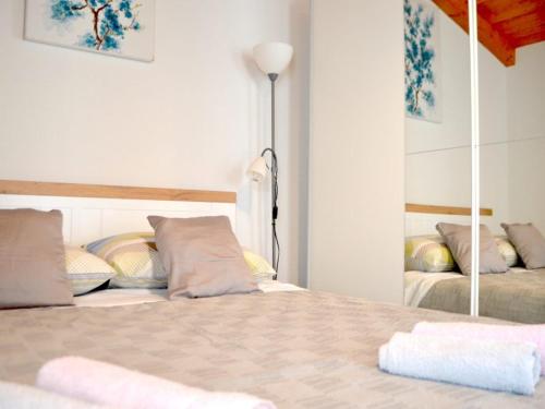 Ένα ή περισσότερα κρεβάτια σε δωμάτιο στο Apartman Julija