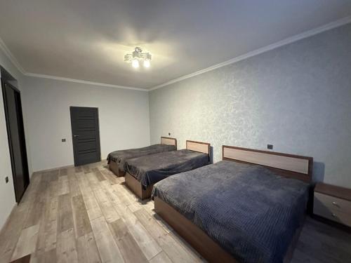 Llit o llits en una habitació de Guest House Mane