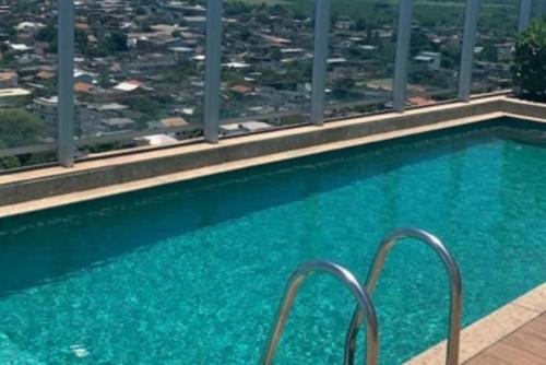 Swimmingpoolen hos eller tæt på Flat em Itaguaí
