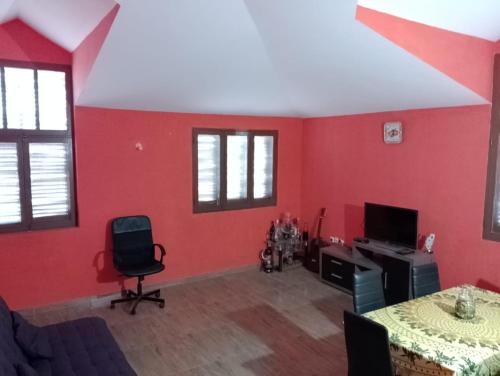 TV a/nebo společenská místnost v ubytování ApartamentoT1 Ponta do Sol