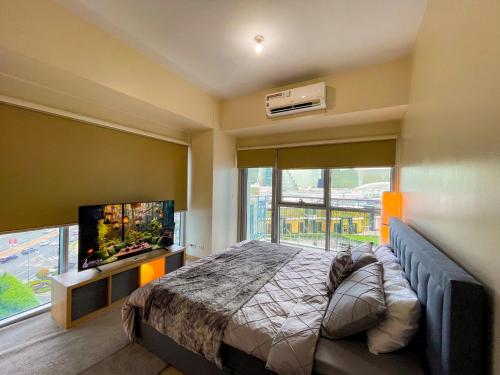 Postel nebo postele na pokoji v ubytování Bayshore Resort Residences - Okada Manila