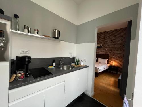 Dapur atau dapur kecil di Apartments an der Arena Leipzig