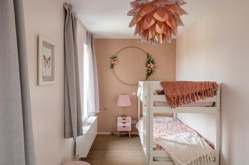 Una cama o camas en una habitación de Watertoren