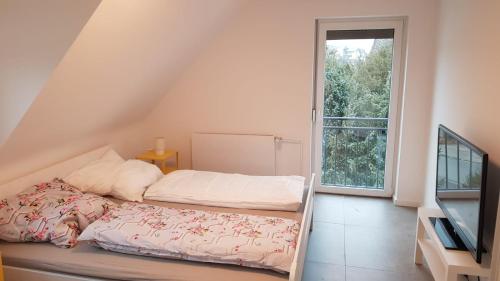 Postel nebo postele na pokoji v ubytování ME Apartments - Quartier Villmar