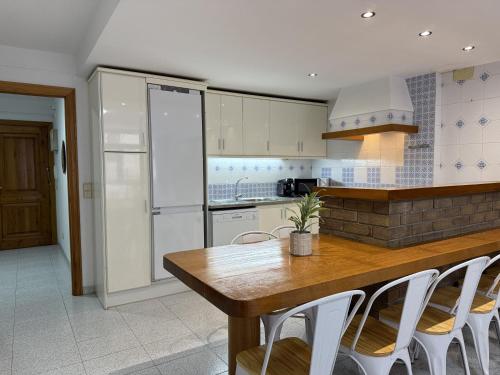 Η κουζίνα ή μικρή κουζίνα στο Agi Pi Sunyer Apartments