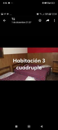 a screenshot of a web page of a bed room at Hotel Cuatro Soles in Mar del Plata